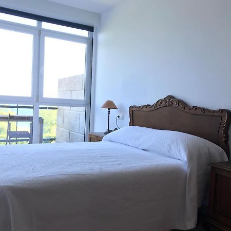 Apartamento Con Terraza Primera Linea De Playa Finisterre Bagian luar foto