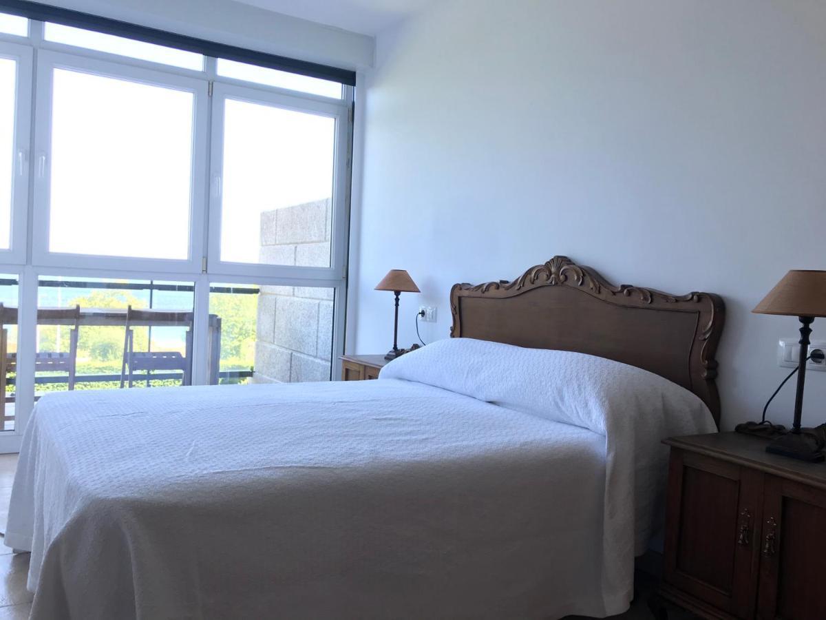 Apartamento Con Terraza Primera Linea De Playa Finisterre Bagian luar foto